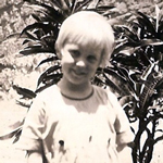 Girl infront of a tree