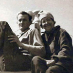 Two people sitting on a boat