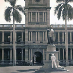 A soldier infront of a statue